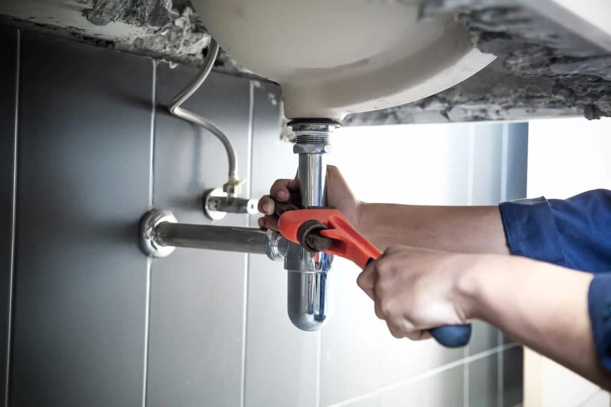 Rocket Ship Plumbing plumber performing plumbing repair in Lawrenceville, GA